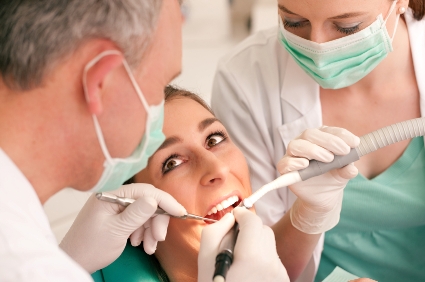 woman undergo dental treatment